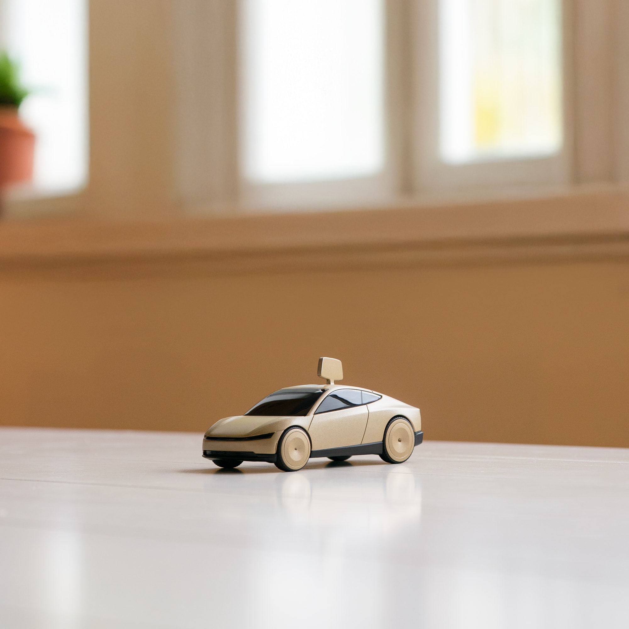 Tesla Cybercab 发条赛车